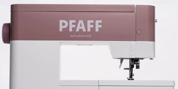 Front view of a Pfaff quilt ambition 160 year anniversary edition sewing machine on a white background. 