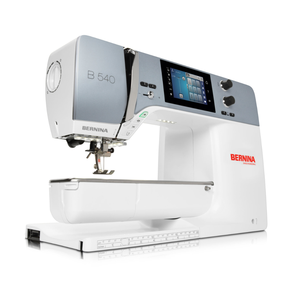 side view of bernina B 540 sewing machine in silver and white with digital display.